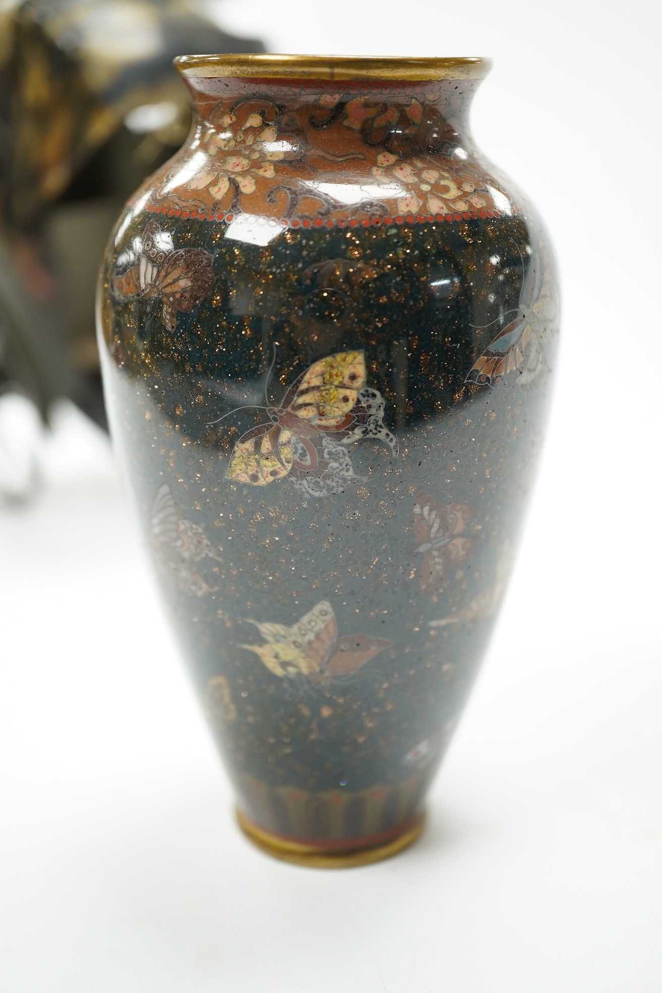 A damaged 19th century Japanese lacquer vase, a Japanese cloisonné enamel vase and a model tortoiseshell and lacquer rickshaw, rickshaw 20cm long., Condition - poor to fair